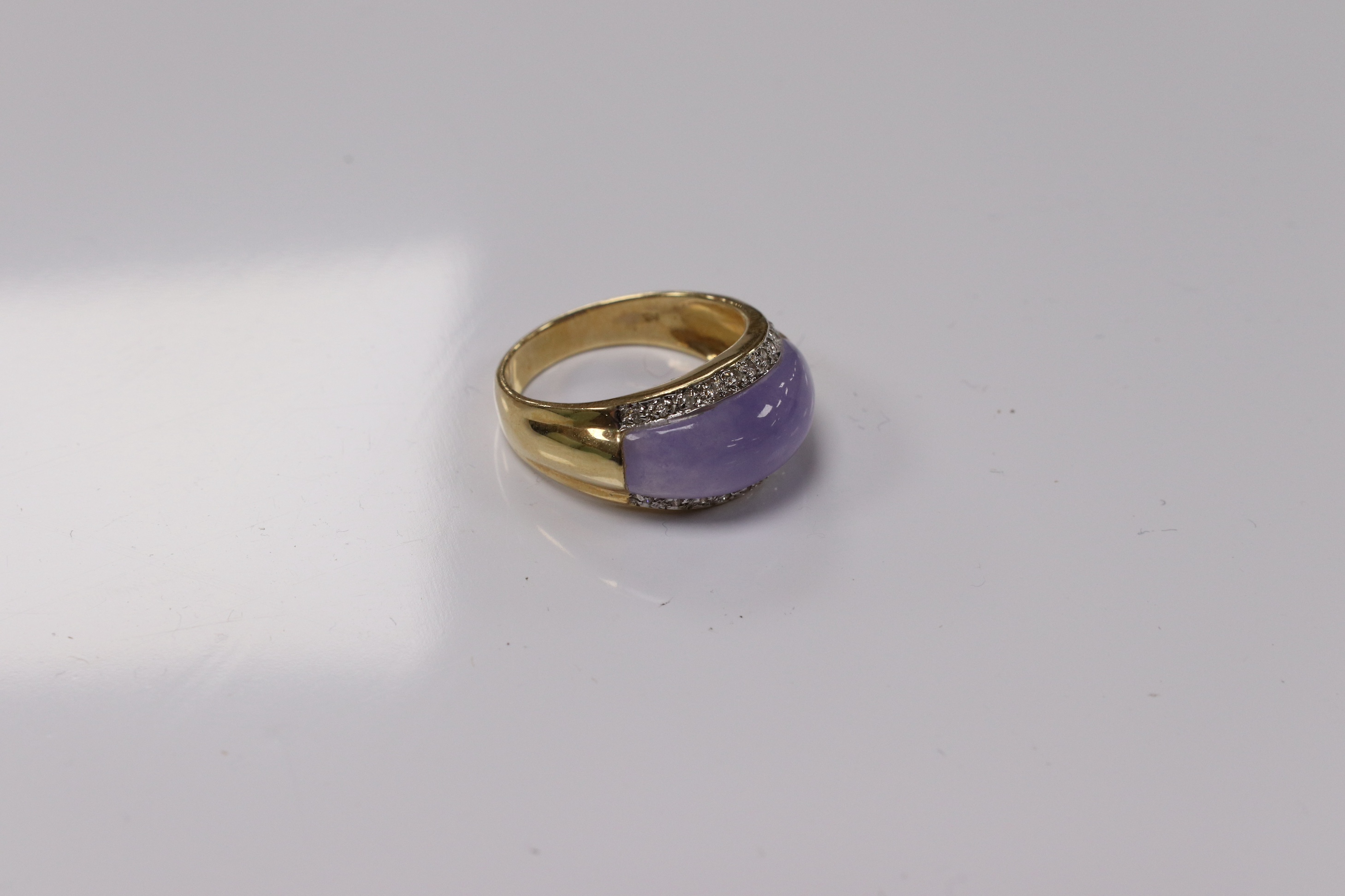 A modern 14k, lavender jade and diamond chip set demi-lune ring, size Q, gross weight 5.6 grams. Condition - fair